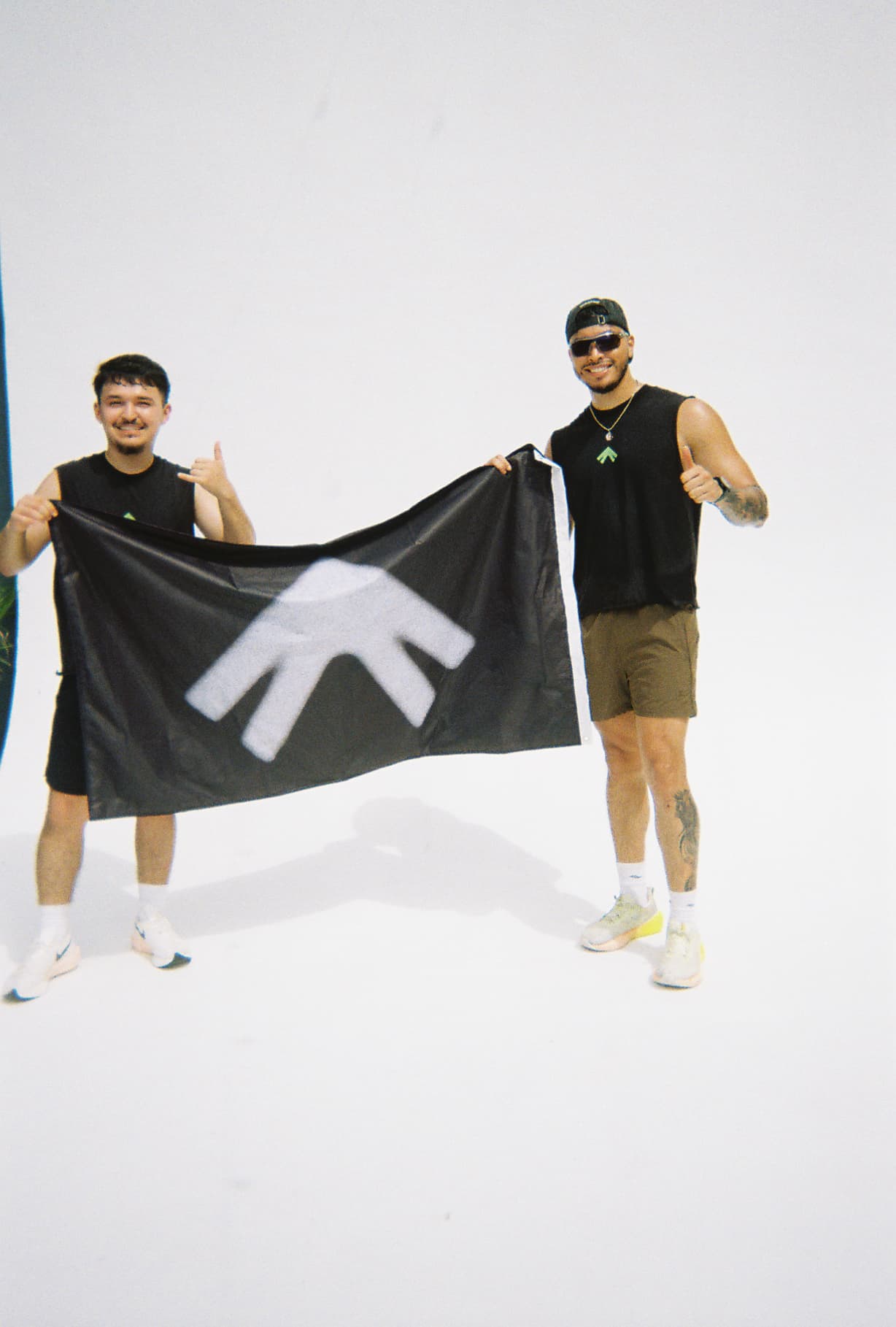 Crew holding the Kairos flag